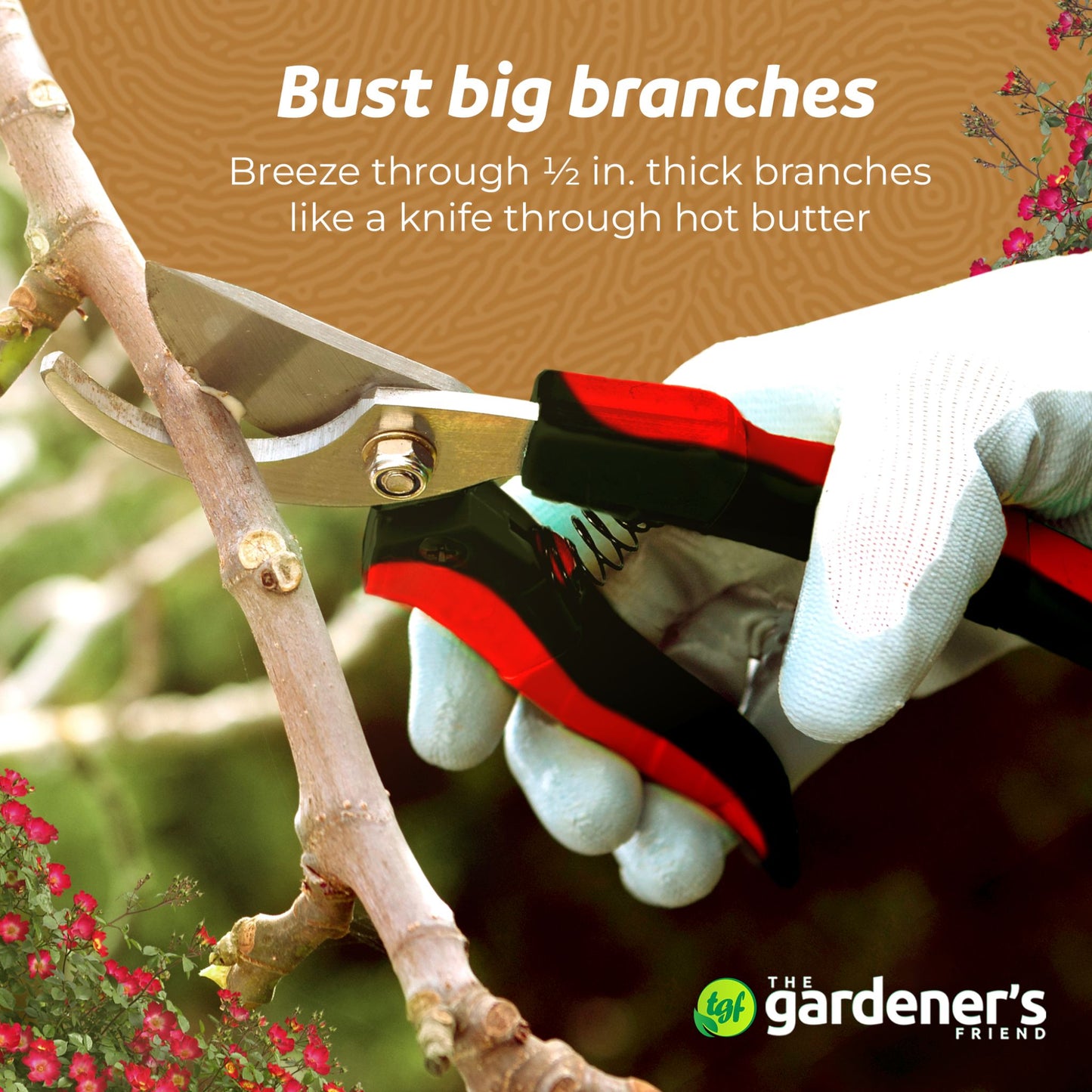 Gloved hand holding bypass pruning shears and cutting a 1/2" thick branch